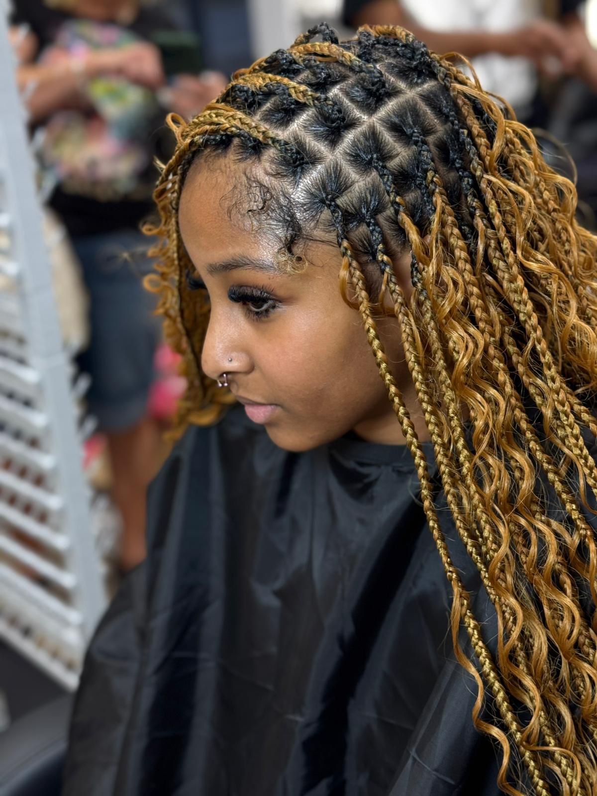 Client protective hairstyle by Melanie Hair Braiding